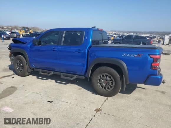 2024 Nissan Frontier Pro-X with VIN 1N6ED1EJ2RN646428, listed as a Copart auction lot 44304215 with 5,853 mi miles and Salvage title. Bid and sale history available at DreamBid. Image 2.