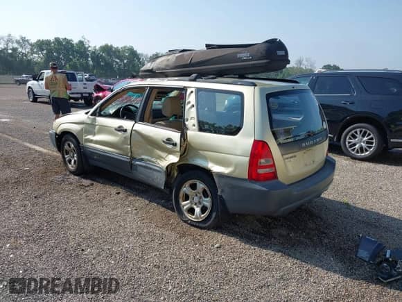 2003 Subaru Forester X with VIN JF1SG63643G749666, listed as a IAAI auction lot 42708610 with 181,727 mi miles and . Bid and sale history available at DreamBid. Image 3.