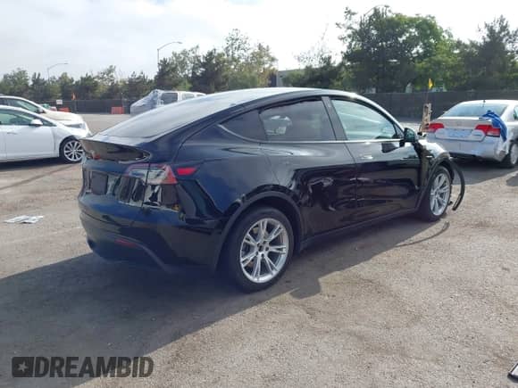 2023 Tesla Model Y Long Range с VIN 7SAYGAEE1PF594220, выставлен на аукционе IAAI как лот 42885301 с пробегом 94 878 миль миль и . История ставок и продаж доступна на DreamBid. Изображение 4.
