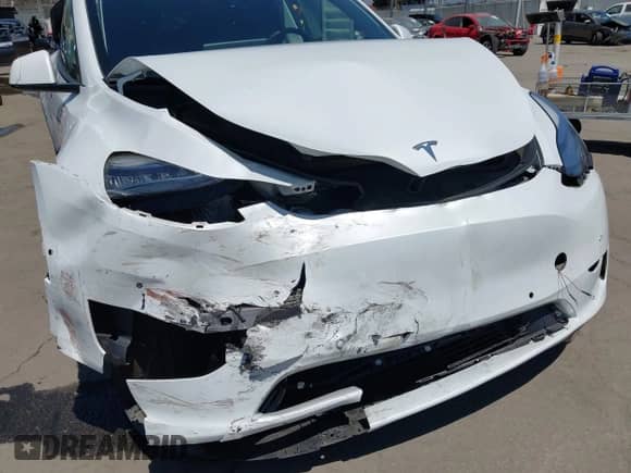 2022 Tesla Model Y Long Range z VIN 7SAYGDEE3NF413701, wystawiony jako IAAI lot #43045999 z przebiegiem 17 042 mil mil oraz . Historia ofert i sprzedaży dostępna na DreamBid. Obrazek 6.
