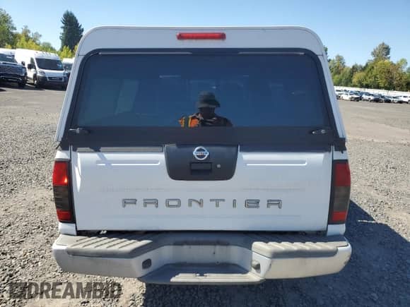 2004 Nissan Frontier XE with VIN 1N6DD26T84C469843, listed as a Copart auction lot 81159685 with 165,857 mi miles and Salvage title. Bid and sale history available at DreamBid. Image 6.