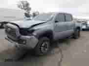 2021 Toyota Tacoma SR5 with VIN 3TMAZ5CN8MM140976, listed as a IAAI auction lot 41513243 with 109,786 mi miles and . Bid and sale history available at DreamBid. Image 2.