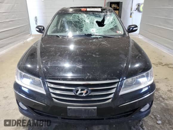 2011 Hyundai Azera Limited с VIN KMHFC4DF1BA544460, выставлен на аукционе Copart как лот 48556125 с пробегом 148 693 миль миль и Списание • Salvage title. История ставок и продаж доступна на DreamBid. Изображение 5.