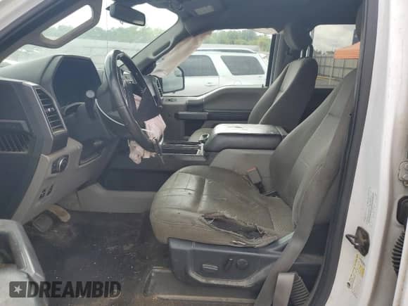 2019 Ford F-150 XL with VIN 1FTEW1E56KKE23932, listed as a Copart auction lot 68314195 with 175,805 mi miles and Salvage title. Bid and sale history available at DreamBid. Image 7.