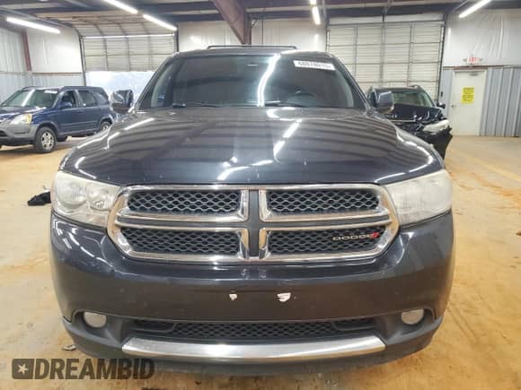 2013 Dodge Durango Crew with VIN 1C4RDJDG9DC682700, listed as a Copart auction lot 68078015 with 169,828 mi miles and Salvage title. Bid and sale history available at DreamBid. Image 5.
