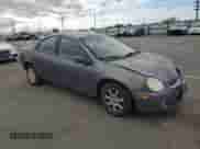 2003 Dodge Neon SXT with VIN 1B3ES56C93D252200, listed as a Copart auction lot 84660075 with 179,726 mi miles and Salvage title. Bid and sale history available at DreamBid. Image 4.