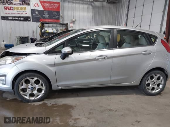 2011 Ford Fiesta SES с VIN 3FADP4FJXBM142897, выставлен на аукционе IAAI как лот 43150222 с пробегом 110 332 миль миль и . История ставок и продаж доступна на DreamBid. Изображение 14.