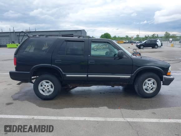 2000 Chevrolet Blazer LS with VIN 1GNDT13W2Y2297715, listed as a IAAI auction lot 42315268 with 198,508 mi miles and . Bid and sale history available at DreamBid. Image 13.