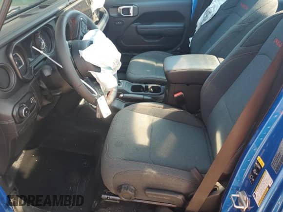 2024 Jeep Wrangler Rubicon with VIN 1C4PJXFG3RW369521, listed as a Copart auction lot 65037115 with 2,499 mi miles and Salvage title. Bid and sale history available at DreamBid. Image 7.