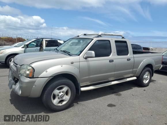 2002 Nissan Frontier SE с VIN 1N6ED29X12C390868, выставлен на аукционе Copart как лот 61083625 с пробегом 127 244 миль миль и Списание • Salvage title. История ставок и продаж доступна на DreamBid. Изображение 1.