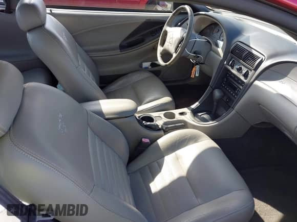 2004 Ford Mustang GT Deluxe z VIN 1FAFP42X54F100661, wystawiony jako IAAI lot #43404344 z przebiegiem 97 152 mil mil oraz . Historia ofert i sprzedaży dostępna na DreamBid. Obrazek 5.