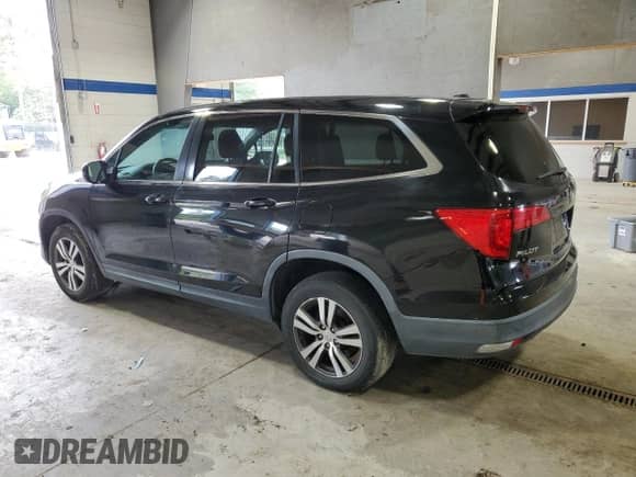 2017 Honda Pilot EX-L with VIN 5FNYF6H50HB017527, listed as a Copart auction lot 80184525 with 198,246 mi miles and Salvage title. Bid and sale history available at DreamBid. Image 2.