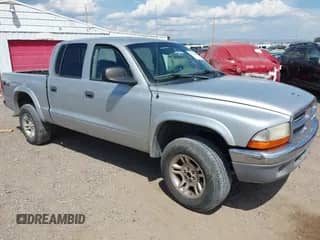 2004 Dodge Dakota SLT with VIN 1D7HG48N94S609108, listed as a IAAI auction lot 43056962 with 245,680 mi miles and . Bid and sale history available at DreamBid. Image 1.