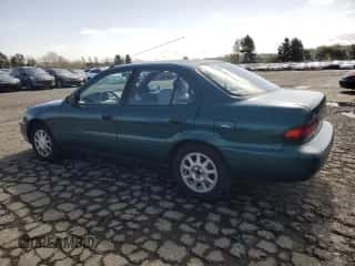 1996 Chevrolet Prizm z VIN 1Y1SK5285TZ058572, wystawiony jako Copart lot #51303845 z przebiegiem 87 109 mil mil oraz Szkoda całkowita • Salvage title. Historia ofert i sprzedaży dostępna na DreamBid. Obrazek 2.