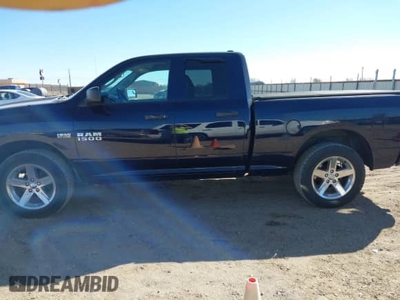 2013 Ram 1500 Tradesman z VIN 1C6RR7FT6DS645891, wystawiony jako IAAI lot #41633549 z przebiegiem 100 200 mil mil oraz . Historia ofert i sprzedaży dostępna na DreamBid. Obrazek 14.