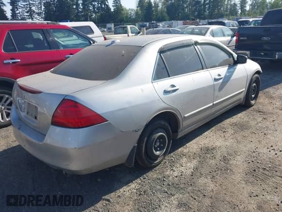 2007 Honda Accord EX-L with VIN 1HGCM66837A057915, listed as a IAAI auction lot 42866627 with 211,425 mi miles and . Bid and sale history available at DreamBid. Image 4.