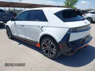 2025 Hyundai Ioniq 5 with VIN KM8KNDA88SU003449, listed as a IAAI auction lot 42808862 with 21,332 mi miles and . Bid and sale history available at DreamBid. Image 3.