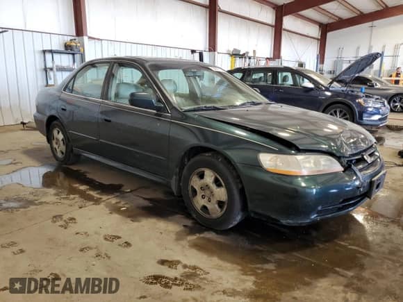 2001 Honda Accord EX z VIN 1HGCG16591A069137, wystawiony jako Copart lot #84871195 z przebiegiem 236 991 mil mil oraz Szkoda całkowita • Salvage title. Historia ofert i sprzedaży dostępna na DreamBid. Obrazek 4.