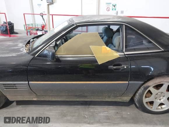 1992 Mercedes-Benz 500 z VIN WDBFA66E7NF043220, wystawiony jako IAAI lot #42744207 z przebiegiem Nie podano mil oraz . Historia ofert i sprzedaży dostępna na DreamBid. Obrazek 14.