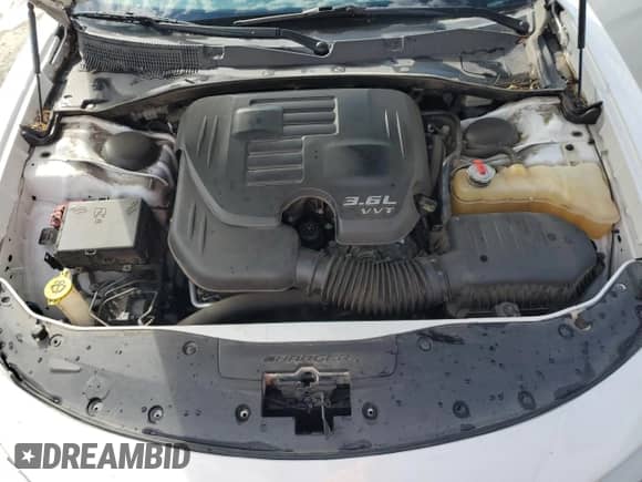 2016 Dodge Charger SE z VIN 2C3CDXBG2GH150237, wystawiony jako Copart lot #82054405 z przebiegiem 110 097 mil mil oraz Czysty tytuł • Clean title. Historia ofert i sprzedaży dostępna na DreamBid. Obrazek 11.