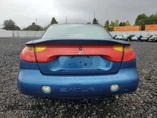 2001 Saturn SC with VIN 1G8ZR12791Z118164, listed as a Copart auction lot 74393904 with 158,308 mi miles and Salvage title. Bid and sale history available at DreamBid. Image 6.