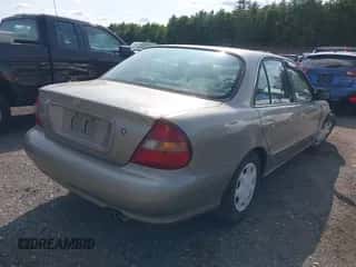 1998 Hyundai Sonata with VIN KMHCF24F4WA126625, listed as a IAAI auction lot 42401944 with 37,690 mi miles and . Bid and sale history available at DreamBid. Image 4.