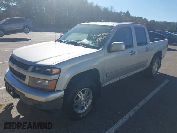 2011 Chevrolet Colorado 1LT z VIN 1GCHTCFE4B8111542, wystawiony jako IAAI lot #43481988 z przebiegiem 79 644 mil mil oraz . Historia ofert i sprzedaży dostępna na DreamBid. Obrazek 20.