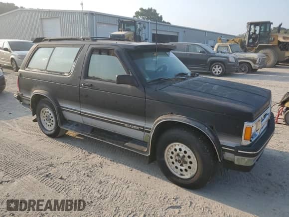 1993 Chevrolet Blazer LS с VIN 1GNCT18W9P0129018, выставлен на аукционе Copart как лот 69456244 с пробегом 93 296 миль миль и Чистый • Clean title. История ставок и продаж доступна на DreamBid. Изображение 4.