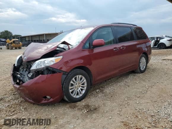 2011 Toyota Sienna XLE AAS with VIN 5TDYK3DC5BS050220, listed as a Copart auction lot 69008955 with 150,197 mi miles and Salvage title. Bid and sale history available at DreamBid. Image 1.