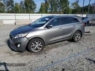 2016 Kia Sorento SXL z VIN 5XYPKDA50GG008209, wystawiony jako Copart lot #72021105 z przebiegiem 117 104 mil mil oraz Szkoda całkowita • Salvage title. Historia ofert i sprzedaży dostępna na DreamBid. Obrazek 1.