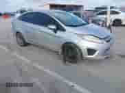 2015 Ford Fiesta SE z VIN 3FADP4BJ1FM220222, wystawiony jako IAAI lot #41209318 z przebiegiem 113 134 mil mil oraz . Historia ofert i sprzedaży dostępna na DreamBid. Obrazek 1.