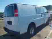 2012 Chevrolet Express Cargo with VIN 1GCWGFCA5C1183889, listed as a IAAI auction lot 43085877 with 168,549 mi miles and . Bid and sale history available at DreamBid. Image 4.