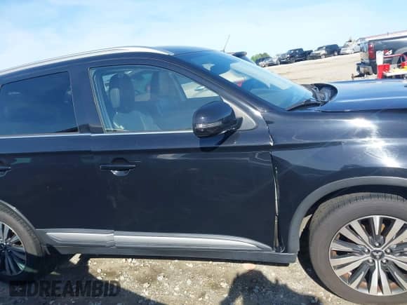 2020 Mitsubishi Outlander SE z VIN JA4AD3A3XLJ000812, wystawiony jako IAAI lot #42288624 z przebiegiem 98 882 mil mil oraz . Historia ofert i sprzedaży dostępna na DreamBid. Obrazek 14.