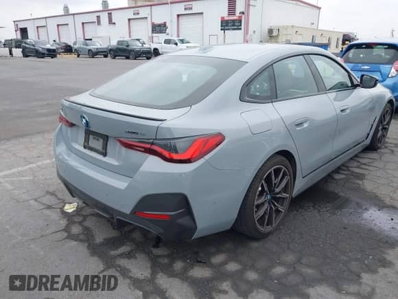 2023 BMW i4 eDrive40 with VIN WBY73AW0XPFR19237, listed as a IAAI auction lot 42428292 with 11,490 mi miles and . Bid and sale history available at DreamBid. Image 4.