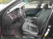 2007 BMW 5 Series 525i with VIN WBANE53577CW66306, listed as a Copart auction lot 87458205 with 175,473 mi miles and Salvage title. Bid and sale history available at DreamBid. Image 7.