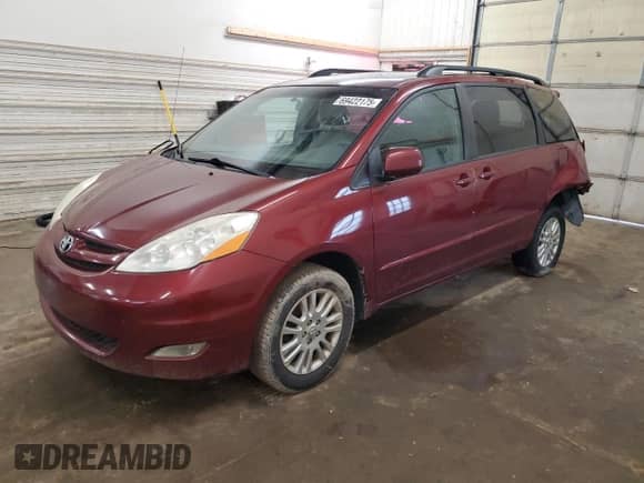 2010 Toyota Sienna XLE с VIN 5TDYK4CC9AS298444, выставлен на аукционе Copart как лот 69422175 с пробегом 245 524 миль миль и Списание • Salvage title. История ставок и продаж доступна на DreamBid. Изображение 1.