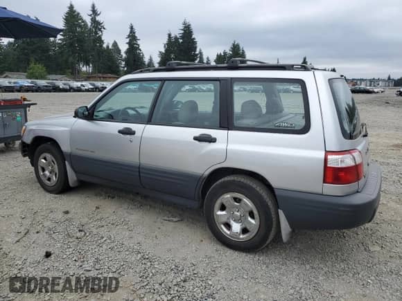 2002 Subaru Forester L with VIN JF1SF63522H752939, listed as a Copart auction lot 70766255 with 197,760 mi miles and Salvage title. Bid and sale history available at DreamBid. Image 2.