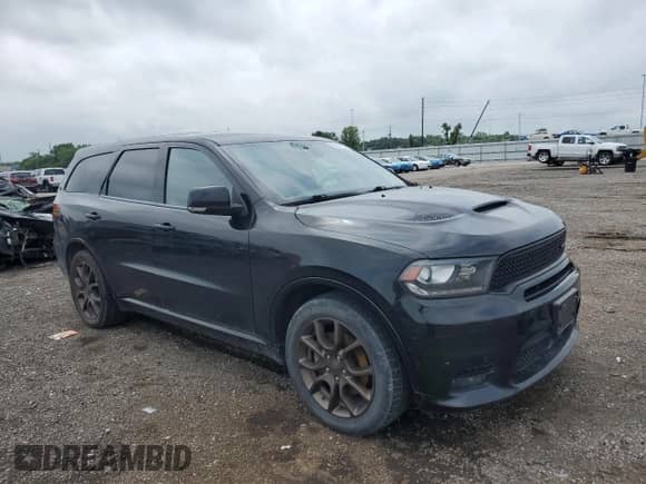 2018 Dodge Durango R/T with VIN 1C4SDJCT8JC327948, listed as a Copart auction lot 65422195 with 104,555 mi miles and Salvage title. Bid and sale history available at DreamBid. Image 4.