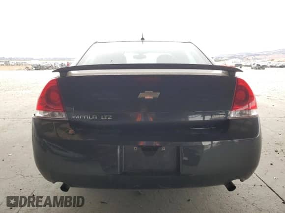 2013 Chevrolet Impala LTZ with VIN 2G1WC5E31D1196700, listed as a Copart auction lot 84242875 with 142,252 mi miles and Clean title. Bid and sale history available at DreamBid. Image 6.