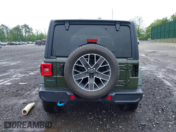 2023 Jeep Wrangler Sahara with VIN 1C4JJXP64PW684210, listed as a IAAI auction lot 42244388 with 23,622 mi miles and . Bid and sale history available at DreamBid. Image 16.