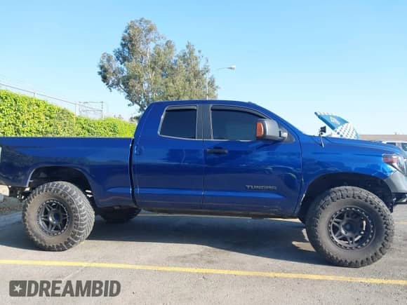 2015 Toyota Tundra SR z VIN 5TFUW5F14FX444236, wystawiony jako IAAI lot #43312117 z przebiegiem 225 064 mil mil oraz . Historia ofert i sprzedaży dostępna na DreamBid. Obrazek 13.