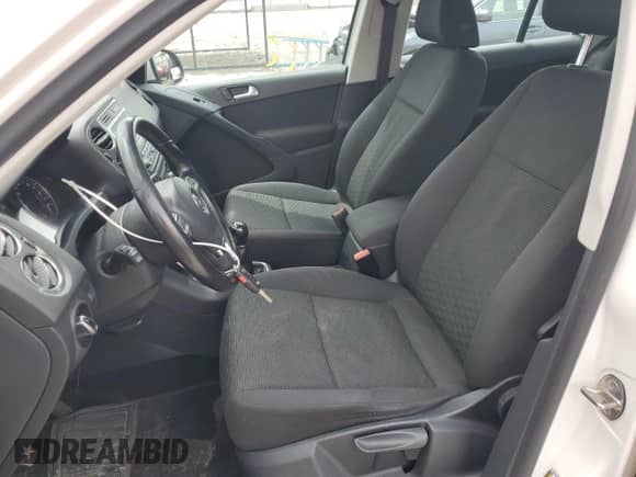 2013 Volkswagen Tiguan with VIN WVGCV3AXXDW601751, listed as a Copart auction lot 57767555 with 98,425 mi miles and Salvage title. Bid and sale history available at DreamBid. Image 7.