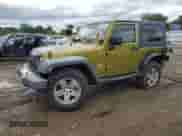 2008 Jeep Wrangler Sahara с VIN 1J4FA54148L579960, выставлен на аукционе Copart как лот 69604735 с пробегом 202 979 миль миль и Списание • Salvage title. История ставок и продаж доступна на DreamBid. Изображение 1.