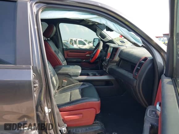 2019 Ram 1500 Rebel z VIN 1C6SRFLT4KN698648, wystawiony jako IAAI lot #42506713 z przebiegiem 143 425 mil mil oraz . Historia ofert i sprzedaży dostępna na DreamBid. Obrazek 5.