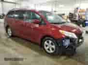 2014 Toyota Sienna LE AAS with VIN 5TDKK3DCXES461817, listed as a Copart auction lot 71806975 with 187,895 mi miles and Non repairable. Bid and sale history available at DreamBid. Image 4.