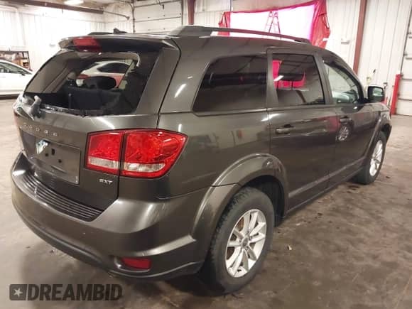 2015 Dodge Journey SXT with VIN 3C4PDDBG3FT596818, listed as a IAAI auction lot 42722530 with 148,968 mi miles and . Bid and sale history available at DreamBid. Image 4.