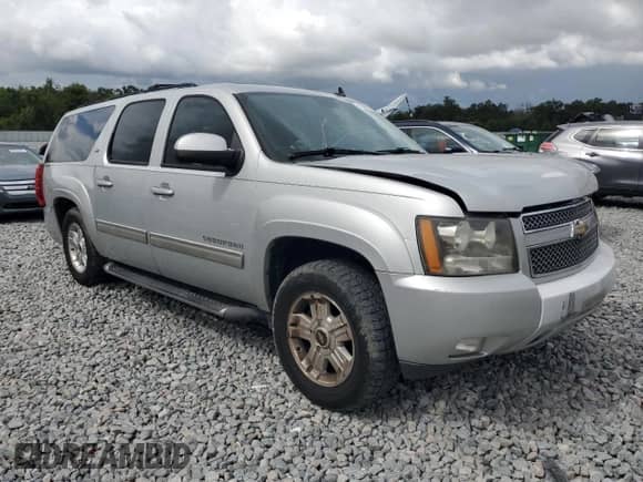 2011 Chevrolet Suburban LT with VIN 1GNSCJE0XBR166076, listed as a Copart auction lot 85882165 with 169,114 mi miles and Salvage title. Bid and sale history available at DreamBid. Image 4.