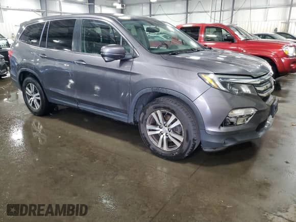 2017 Honda Pilot EX-L z VIN 5FNYF6H70HB027184, wystawiony jako Copart lot #85877605 z przebiegiem 180 606 mil mil oraz Szkoda całkowita • Salvage title. Historia ofert i sprzedaży dostępna na DreamBid. Obrazek 4.