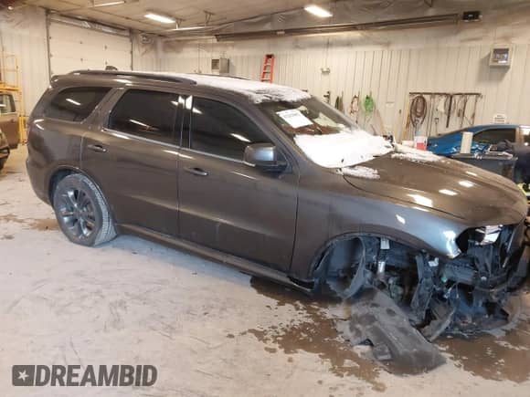 2020 Dodge Durango GT with VIN 1C4RDJDG9LC229840, listed as a IAAI auction lot 41263602 with 98,518 mi miles and . Bid and sale history available at DreamBid. Image 1.