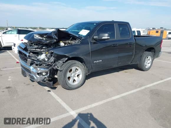 2022 Ram 1500 Big Horn with VIN 1C6RRFBG0NN287593, listed as a IAAI auction lot 43255671 with 59,801 mi miles and . Bid and sale history available at DreamBid. Image 2.